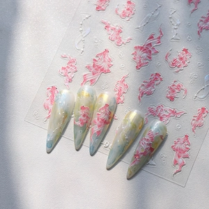 3D embossed koi fish nail stickers with gold foil details on clear frosted glass texture