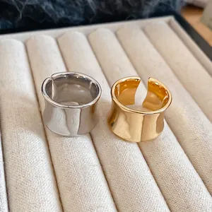 Minimalist wide irregular gold and silver open rings with mirror polished metal finish