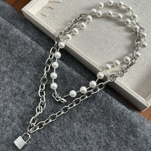 Minimalist double-layer silver chain necklace with pearls and a square lock pendant