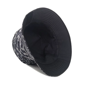 Detail view of the black and gray leopard print bucket hat with durable inner lining