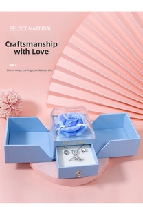 Blue jewelry gift box with preserved rose featuring necklace and earring compartments