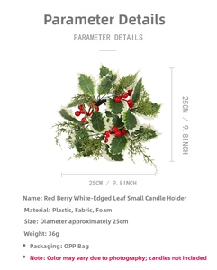 Detailed view of Christmas candle ring with red berries and white-edged holly leaves