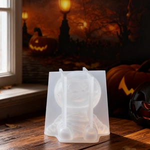 Translucent silicone mold for cute mummy candle with detailed bandage textures
