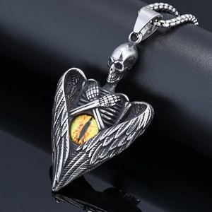Gothic skull pendant necklace with angel wings and yellow evil eye in antique silver