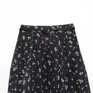 Floral print chiffon midi skirt in black with daisy patterns and a slim belted waist