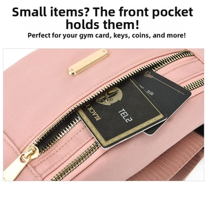 Detailed macro view of pink PU shoulder bag front pocket with golden zipper and logo plate