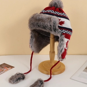 Winter knitted trapper hat with maple leaf pattern and warm faux fur lining