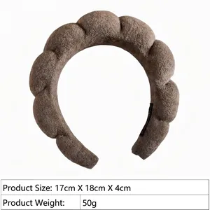 Brown plush sponge padded headband showing dimensions 17x18x4cm and soft wavy texture