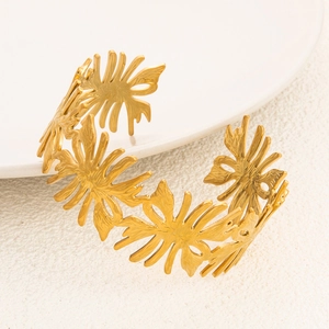 18k gold plated stainless steel open bangle featuring intricate hollow leaf and flower design