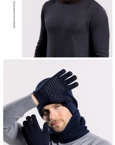 Detailed knit texture of navy blue winter hat, scarf, and touchscreen gloves set
