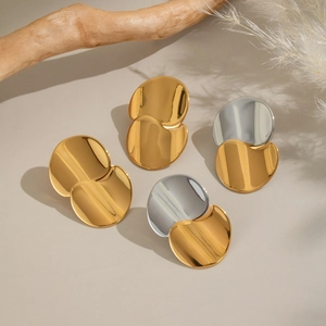 Minimalist two-tone geometric circular earrings in gold and silver stainless steel