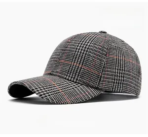 Close-up of gray Prince of Wales check fabric on a vintage style baseball cap