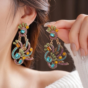 Vintage peacock flower earrings with colorful rhinestones in a luxurious gold finish