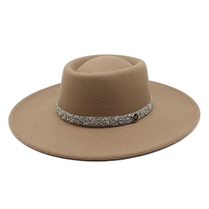 Detailed view of khaki wool felt fedora with rhinestone band and golden M logo buckle