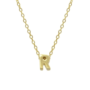 Macro shot of 925 sterling silver capital letter R pendant with golden finish chain