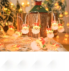 Detail of Santa Claus LED string lights with warm yellow glow and transparent wire