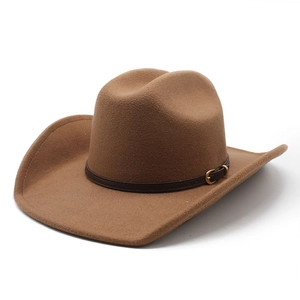 Close-up of brown wool felt cowboy hat with vintage leather belt and metal buckle detail