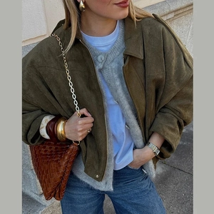 Deep olive green suede pilot jacket with shoulder buttons and a belted waist for women