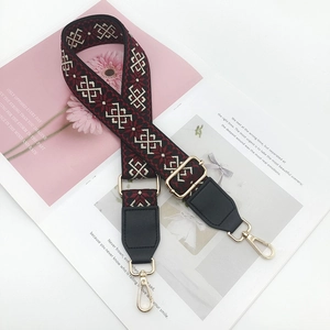 Adjustable wide canvas shoulder strap with geometric pattern and gold swivel hooks