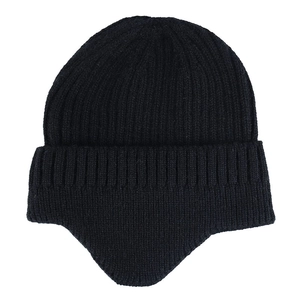 Detail view of black knit winter beanie with thick fleece lining and ear protection flap