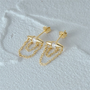 Detailed close-up of 925 sterling silver gold-plated stud earrings with cz spikes and double chains