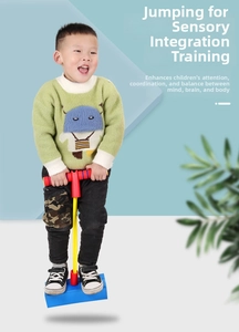 Blue foam pogo jumper with yellow elastic cord and non-slip handles for sensory training
