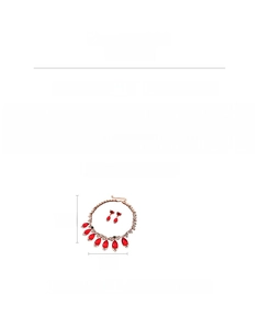 Detailed view of red teardrop vintage jewelry set with necklace and matching earrings