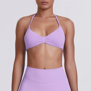 Close-up of lavender seamless high-waist yoga set with ribbed knit compression texture