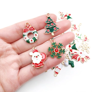 Assorted Christmas alloy drip oil charms with Santa and tree held in hand for DIY size