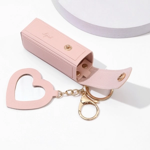 Pink leather lipstick case with heart mirror charm and gold chain, 2025 mini portable bag