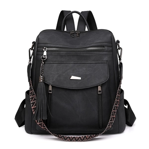 Zaino da donna in pelle PU testurizzata nera con nappa decorativa e spallacci intrecciati