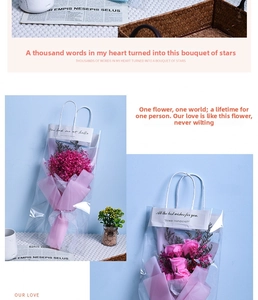 Detail of baby's breath and soap rose bouquet in a transparent tote bag gift box