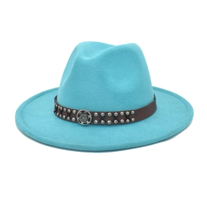 Detailed view of the turquoise wool fedora with a studded brown leather hat band decoration