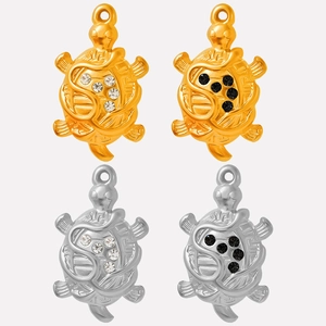 Detail view of 304 stainless steel turtle pendants with 18k gold plating and crystals