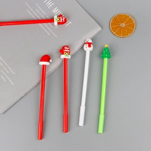Set of four Christmas themed pens with silicone Santa hat, tree, snowman and glove toppers