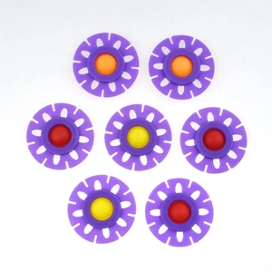 Detailed set of 7 colorful silicone snowflake stress relief sensory pop-it fidget toys