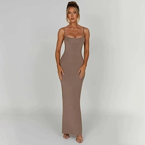 Detail showing the brown backless slim fit evening dress with floor-length hemline