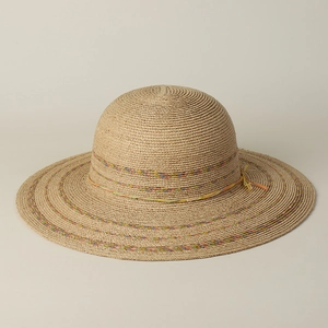 Close-up of handmade raffia sun hat with colorful woven cord and wide brim texture