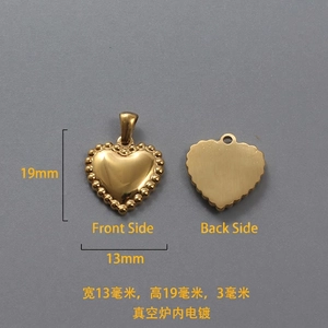 Macro detail of 18k gold heart pendant with dimensions 13mm by 19mm and polished finish