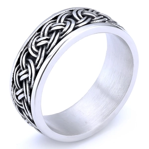 Macro shot of silver Viking knot ring featuring Celtic braided pattern and brushed interior