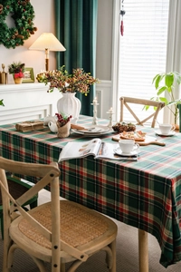 Close-up of red and green plaid pattern on high-quality festive Christmas tablecloth fabric