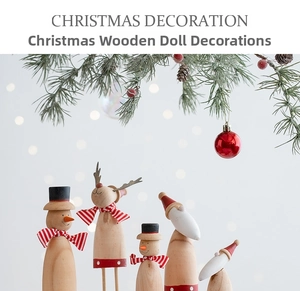 Close-up of wooden Christmas figurines with knitted scarves and pine cone accents