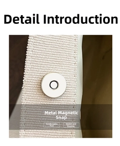 Detail shot of the durable silver magnetic snap button on the beige corduroy bag