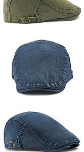 Détail de béret en jean délavé avec boucle en métal bronze ajustable et coutures renforcées