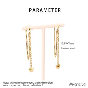Detail view of 18K gold plated stainless steel heart tassel earrings with dimensions