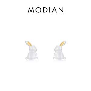 Minimalist s925 sterling silver bunny stud earrings with matte finish and gold accents