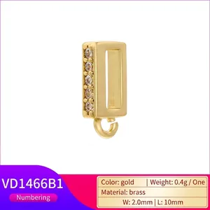 Detail of 18K gold plated brass connector with 5 cubic zirconia stones and bottom loop