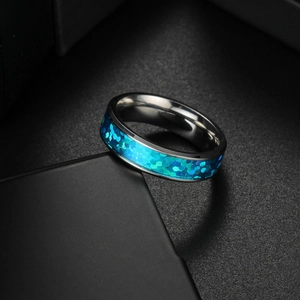 Titanium steel ring for men with blue imitation opal inlay on a black matte background