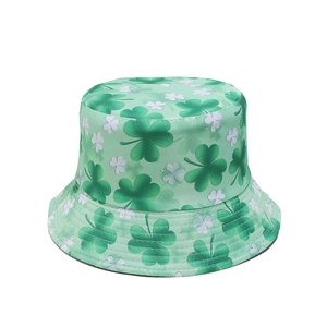 Detail of St. Patrick's Day bucket hat with green clover shamrock pattern print
