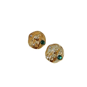 Vintage gold rabbit relief earrings with green gemstone and sparkling crystals